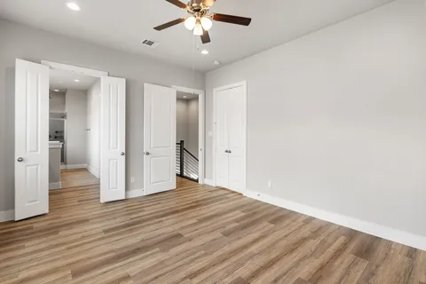 a bathroom with a sink a vanity a mirror and a shower