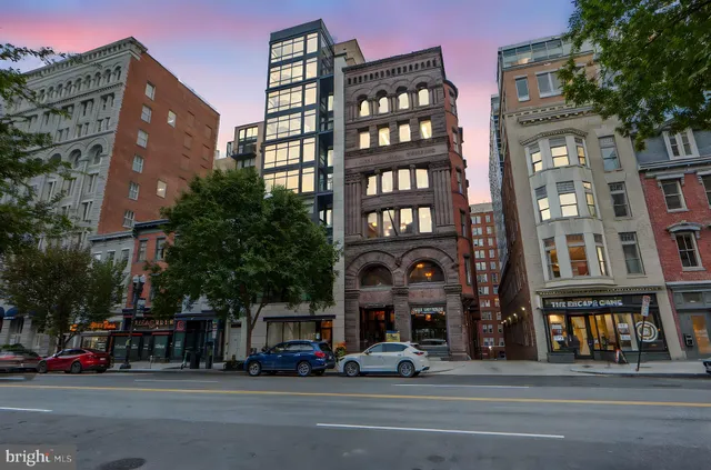 a view of a building and a street