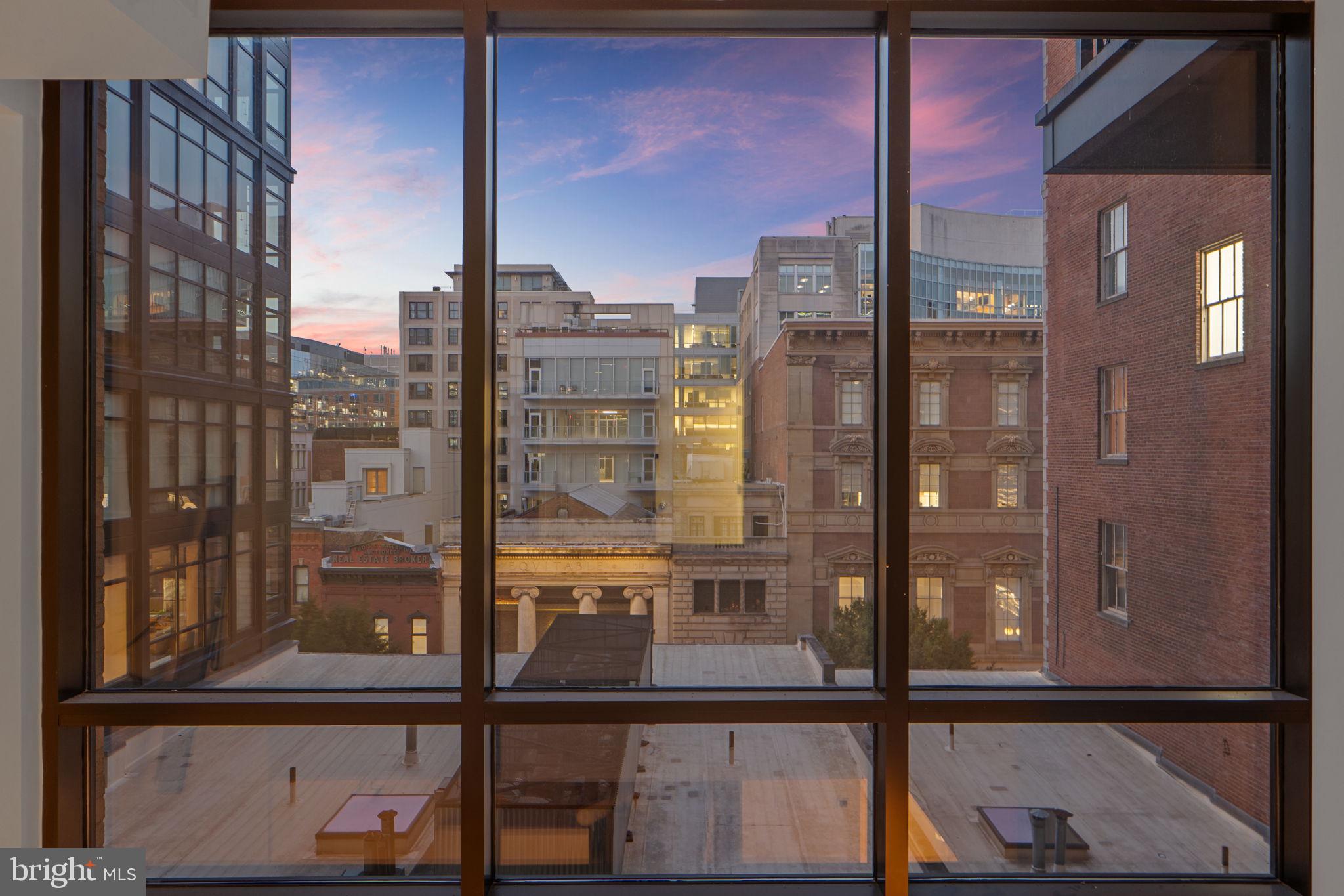 912 F Street Northwest, Unit 508 Washington, DC 20004 - Photo 19 of 40 a city view with tall buildings