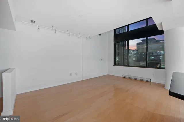 a view of a kitchen with a sink