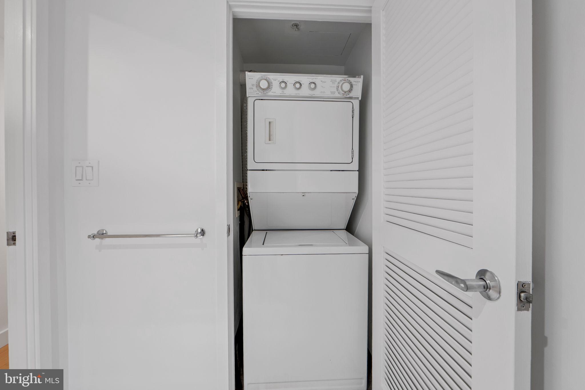 912 F Street Northwest, Unit 508 Washington, DC 20004 - Photo 28 of 40 a utility room with dryer and washer