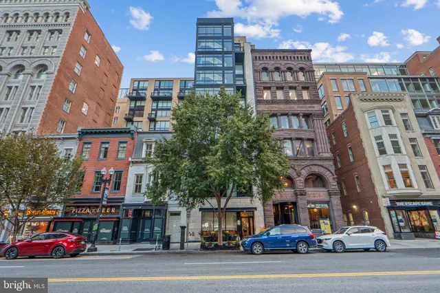 a view of a building and a street