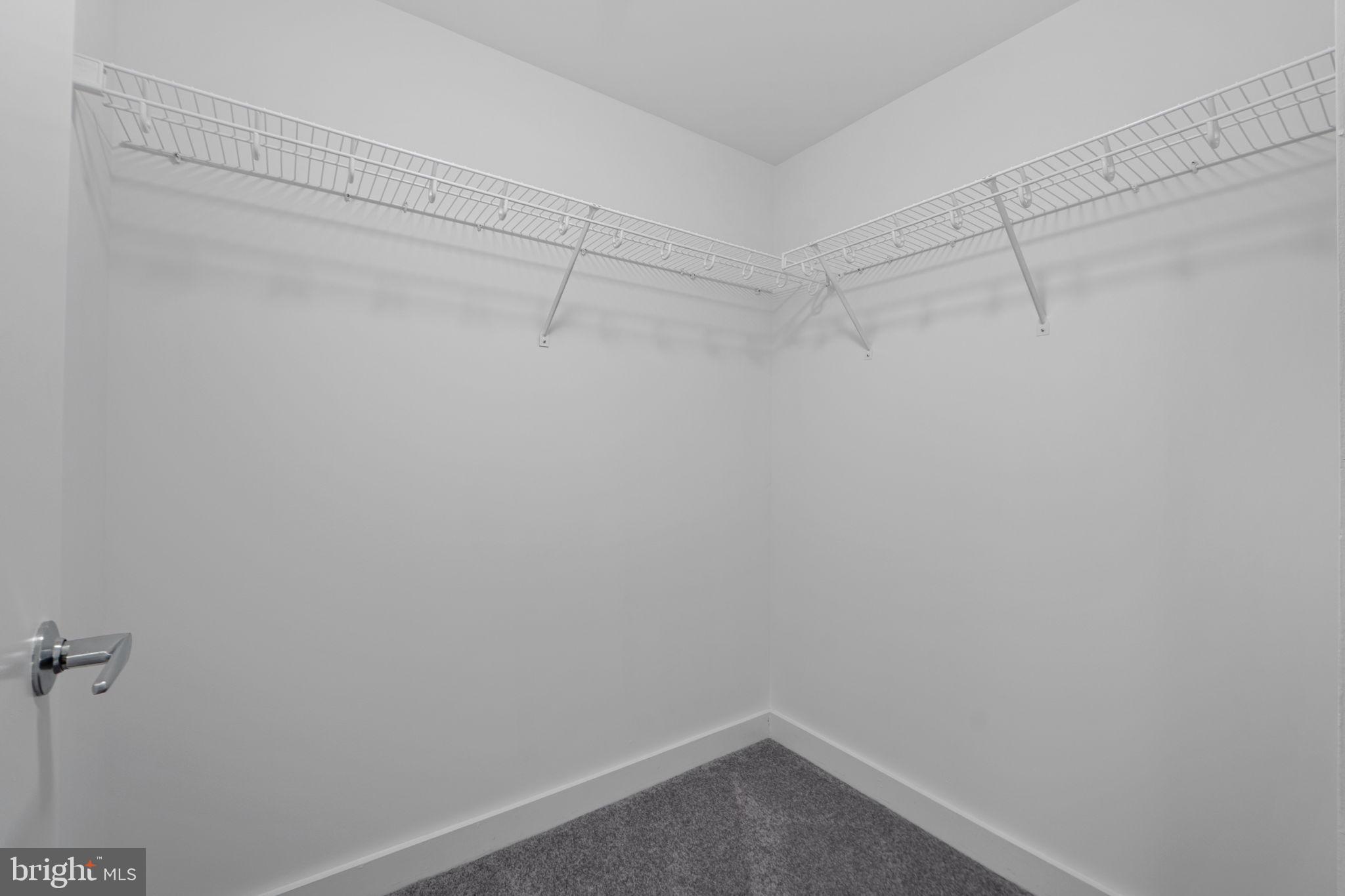 912 F Street Northwest, Unit 508 Washington, DC 20004 - Photo 33 of 40 a view of a room with racks on the wall