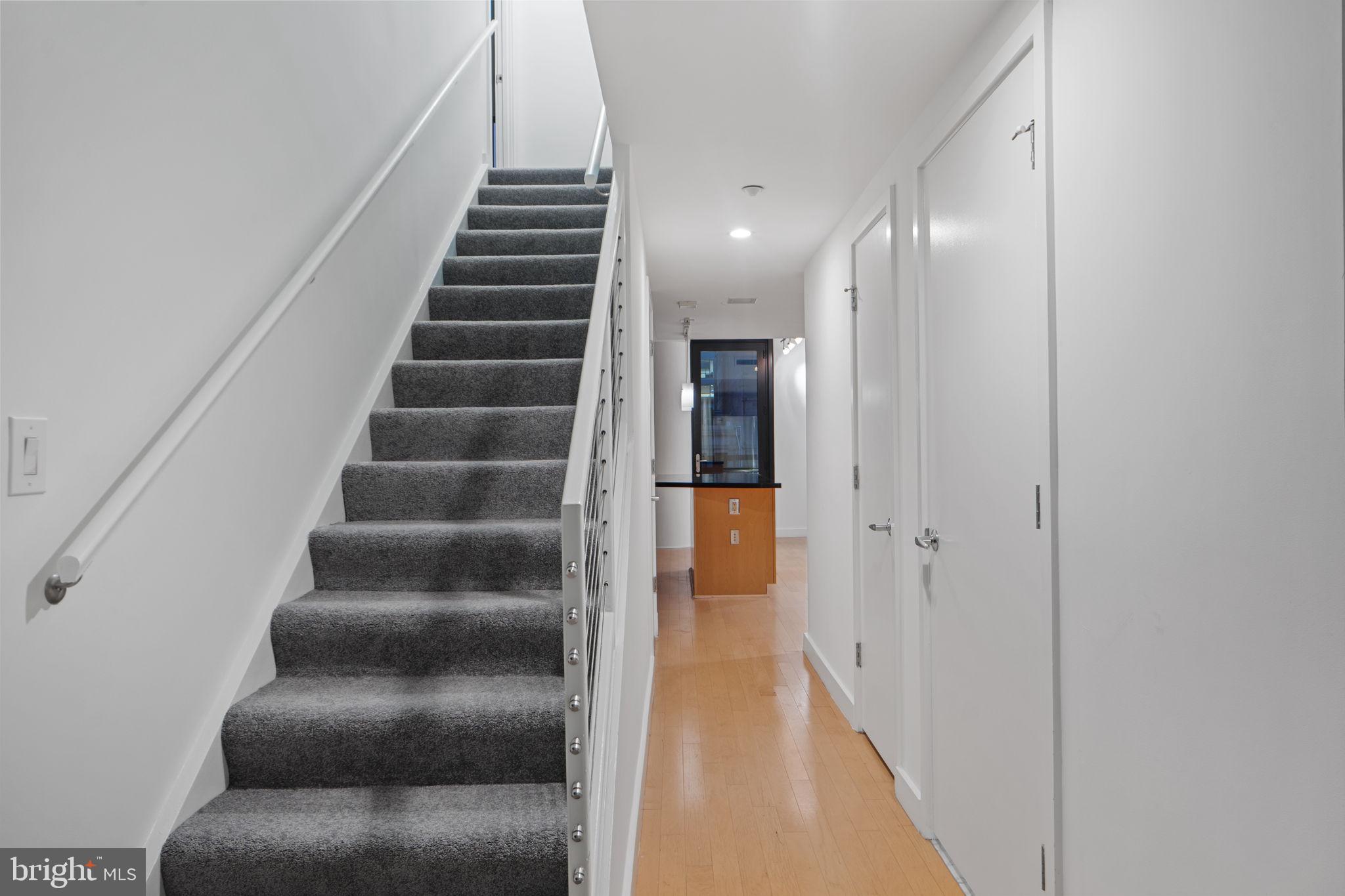 912 F Street Northwest, Unit 508 Washington, DC 20004 - Photo 9 of 40 a view of entryway and hall with wooden floor