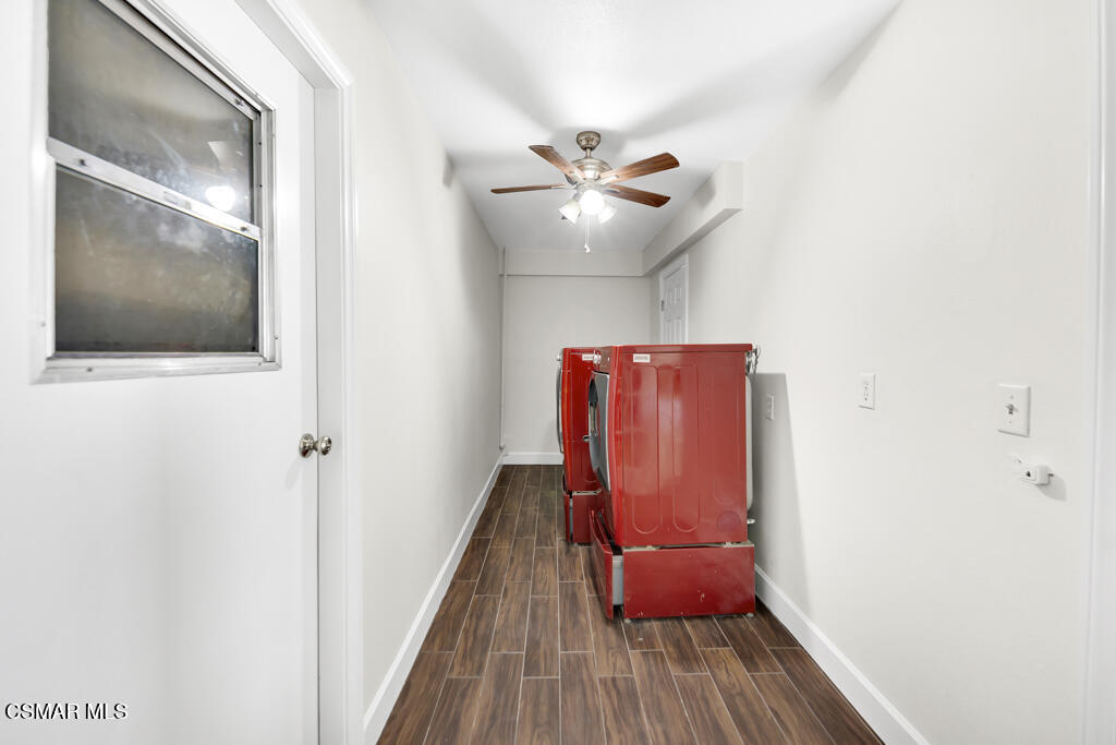 39202 Willowvale Road Palmdale, CA 93551 - Photo 16 of 36 a view of a hallway with wooden floor and closet