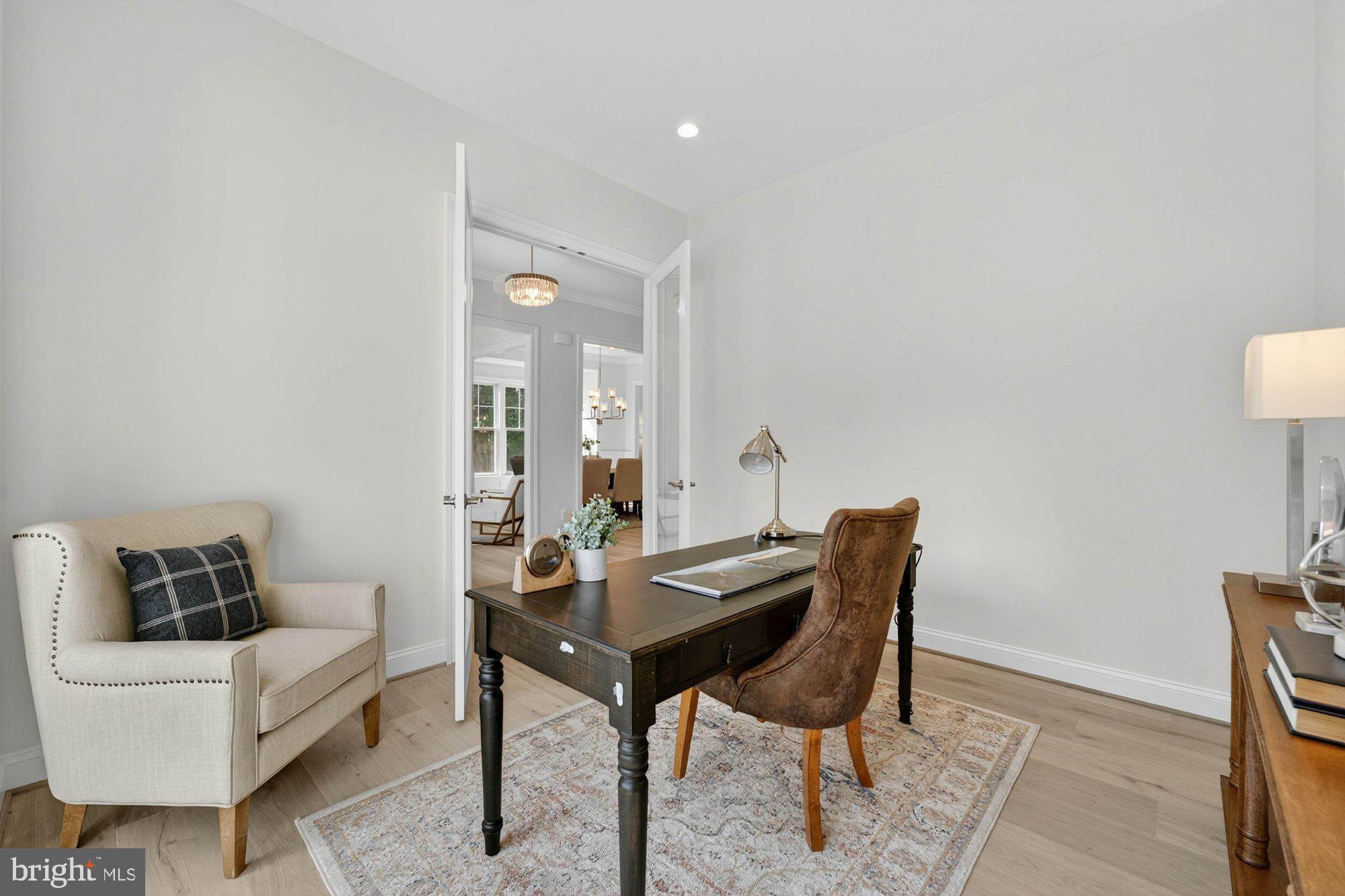 1436 Layman Street McLean, VA 22101 - Photo 14 of 105 a living room with furniture and a potted plant