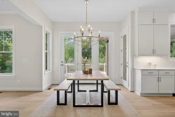 a bathroom with a sink toilet vanity and shower