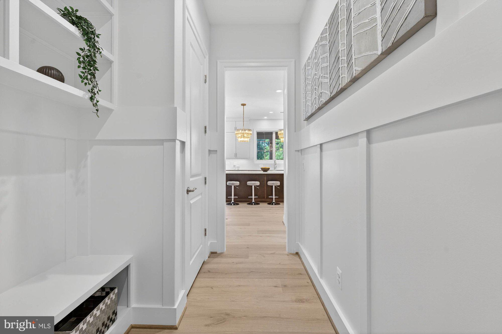 1436 Layman Street McLean, VA 22101 - Photo 37 of 105 a view of a hallway view with wooden floor and staircase