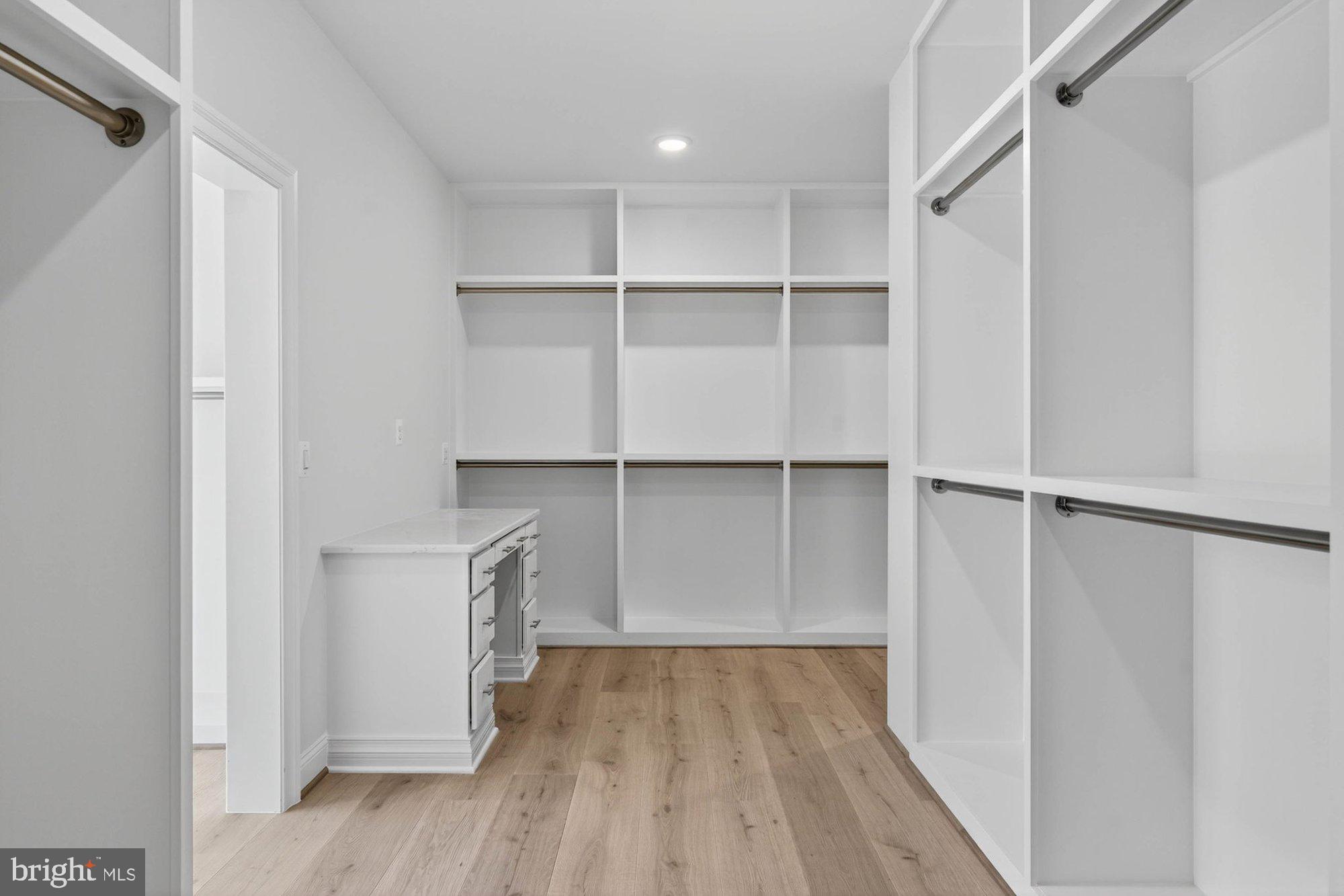 1436 Layman Street McLean, VA 22101 - Photo 76 of 105 a view of walk in closet with empty racks