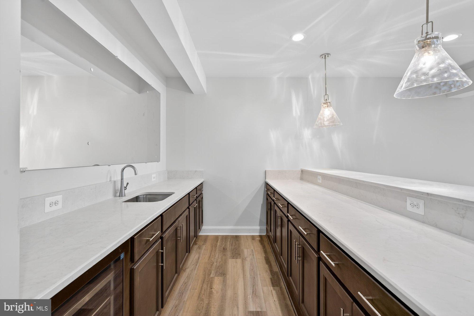 1436 Layman Street McLean, VA 22101 - Photo 84 of 105 a kitchen with a sink and dishwasher