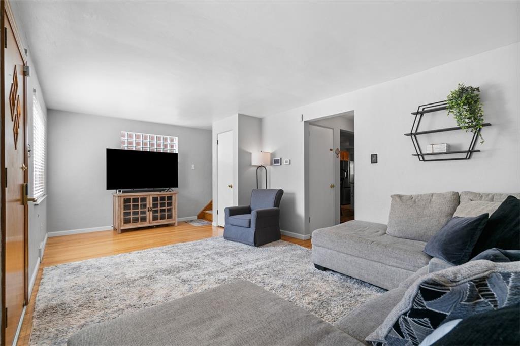 1538 Rutherford Avenue Pittsburgh, PA 15216 - Photo 12 of 43 a living room with furniture and a flat screen tv