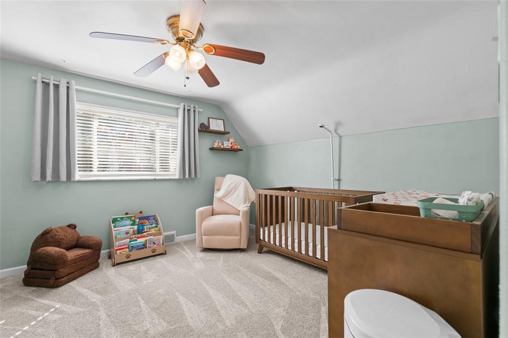 1538 Rutherford Avenue Pittsburgh, PA 15216 - Photo 14 of 43 a bedroom with furniture and a window