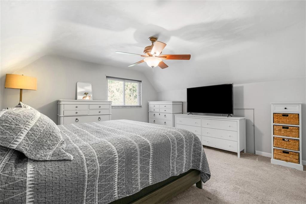 1538 Rutherford Avenue Pittsburgh, PA 15216 - Photo 18 of 43 a bedroom with a bed and a flat screen tv