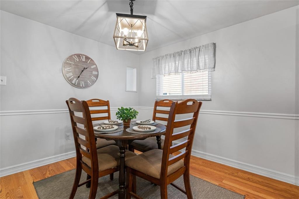 1538 Rutherford Avenue Pittsburgh, PA 15216 - Photo 23 of 43 a table and chairs in a room with a window