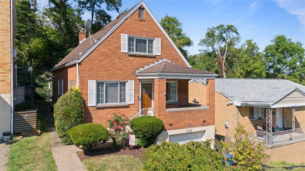 1538 Rutherford Avenue Pittsburgh, PA 15216 - Photo 3 of 43 front view of a house with a yard
