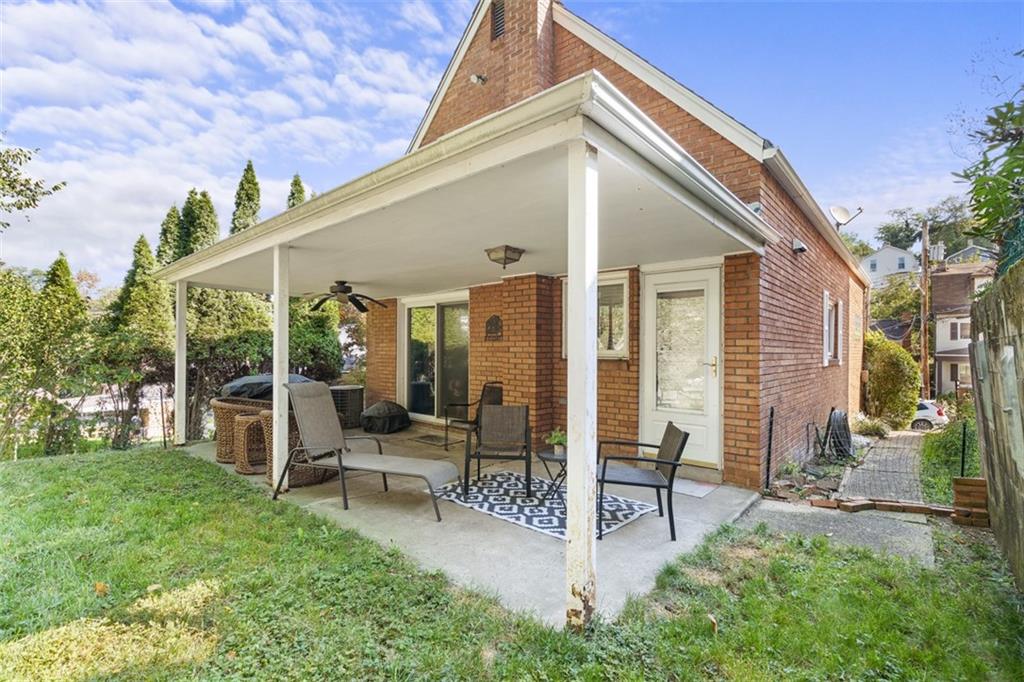 1538 Rutherford Avenue Pittsburgh, PA 15216 - Photo 34 of 43 a patio with table and chairs and potted plants