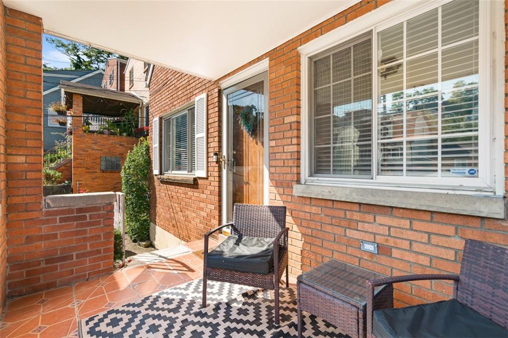 1538 Rutherford Avenue Pittsburgh, PA 15216 - Photo 6 of 43 a view of a patio with table and chairs and potted plants