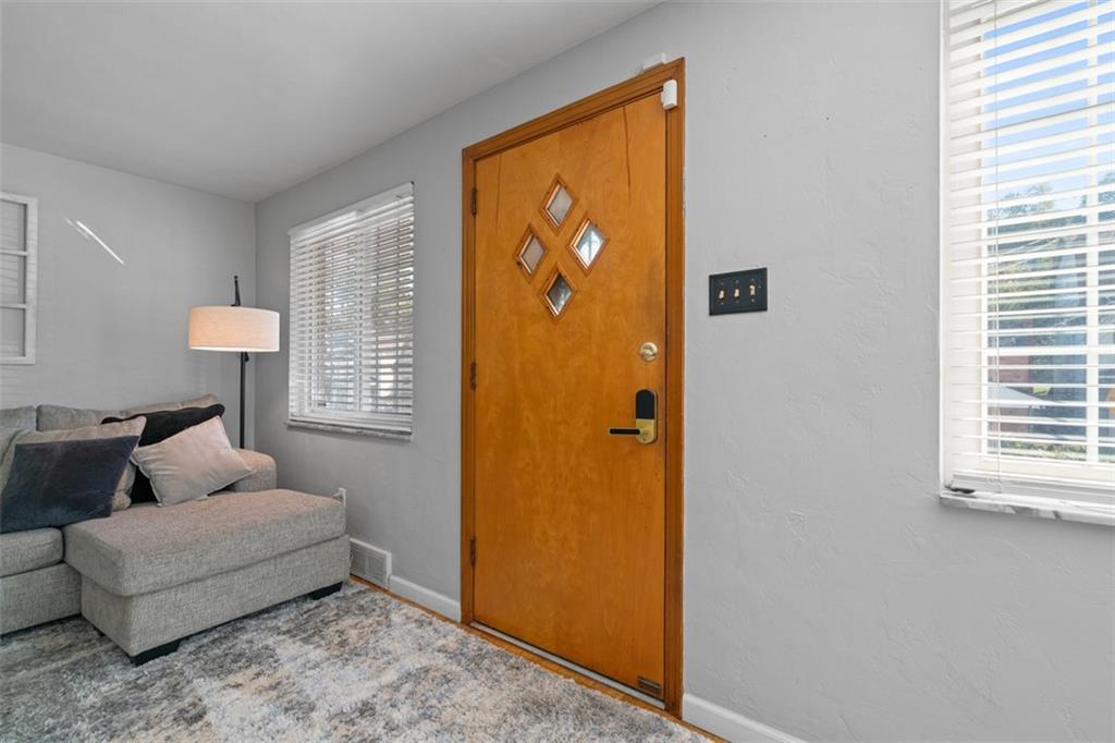 1538 Rutherford Avenue Pittsburgh, PA 15216 - Photo 8 of 43 a living room with furniture and a window