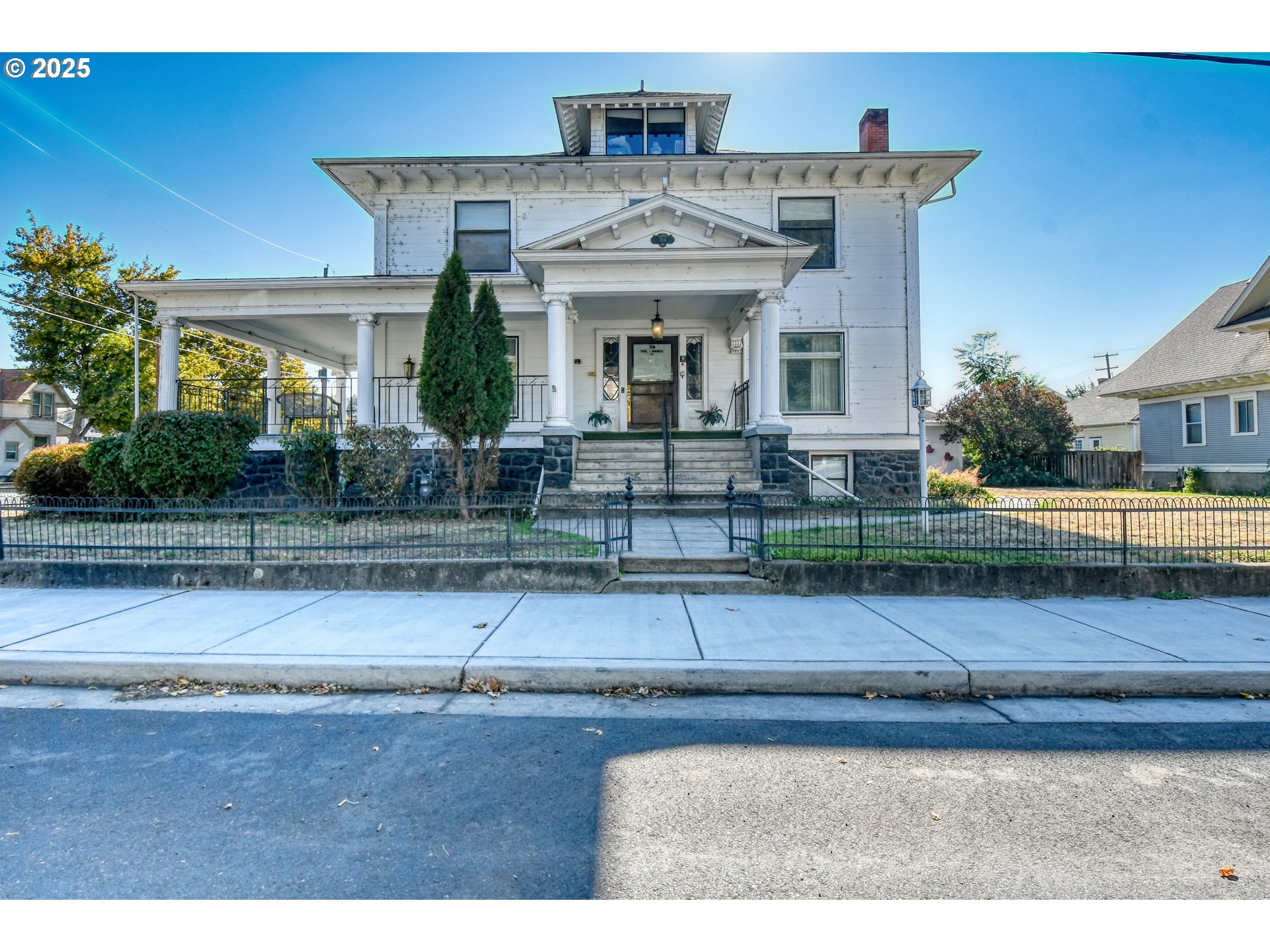a front view of a house with garage