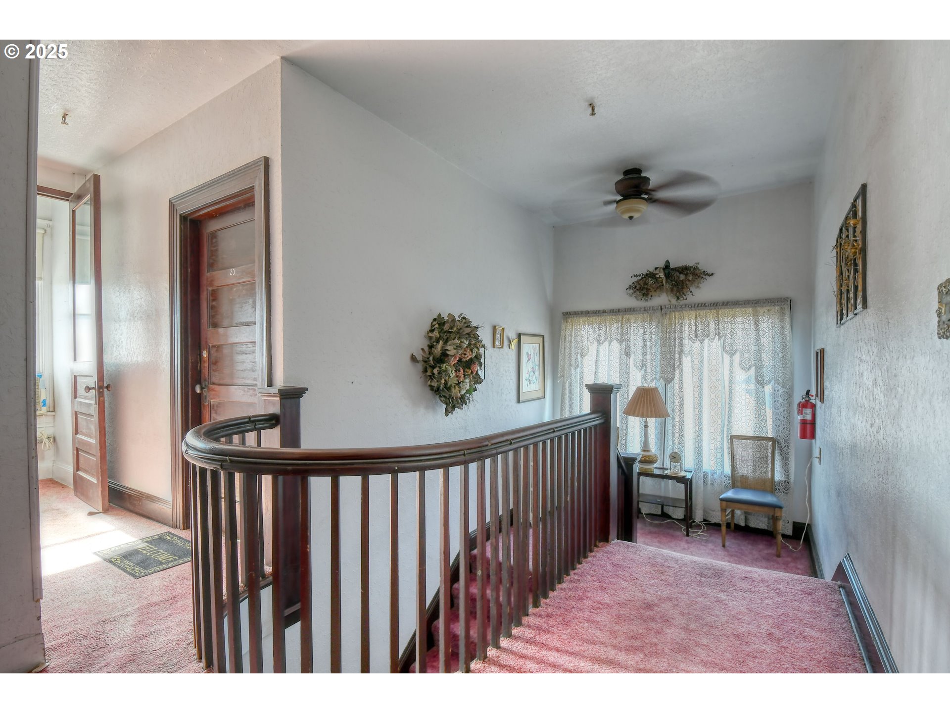 714 Southeast Byers Avenue Pendleton, OR 97801 - Photo 14 of 46 a view of a hallway and a livingroom with furniture