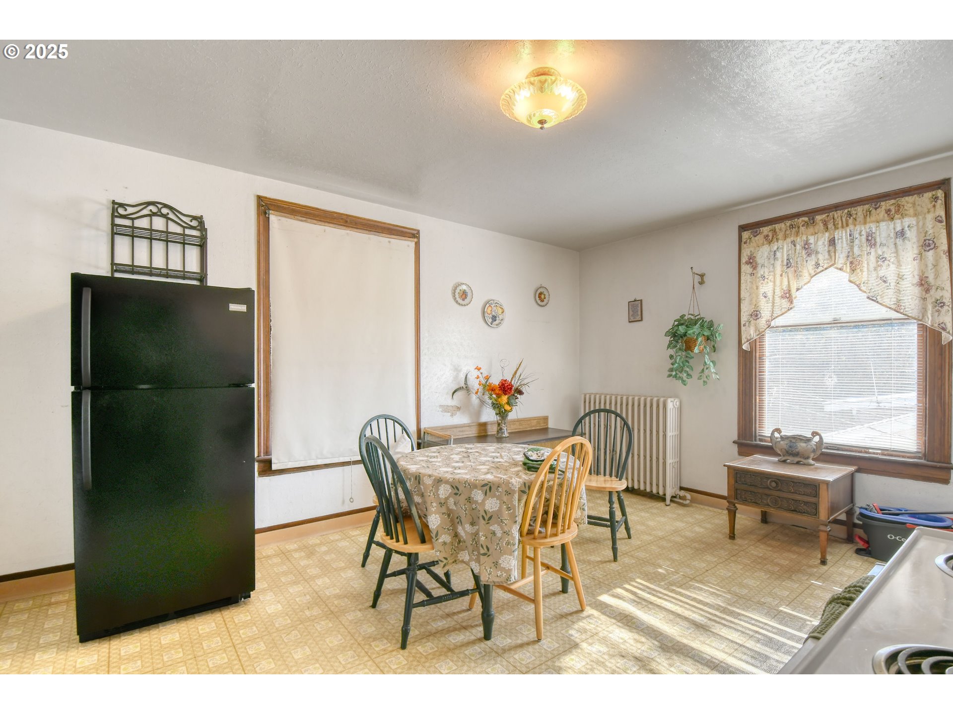 714 Southeast Byers Avenue Pendleton, OR 97801 - Photo 21 of 46 a view of a dining room with furniture and a large window