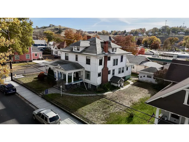 a black and white photo of a house