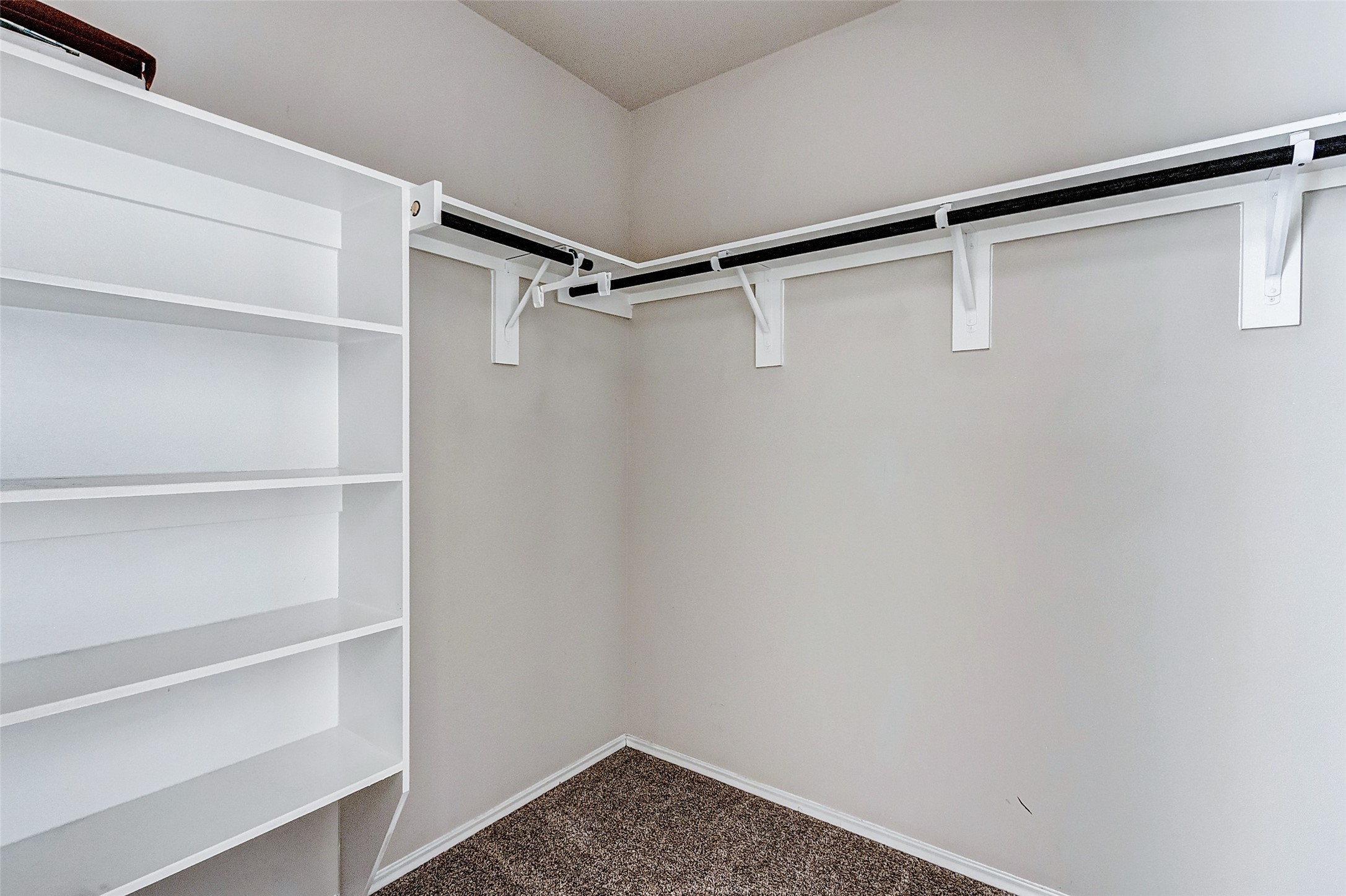 40454 Red Poppy Lane Magnolia, TX 77354 - Photo 14 of 23 a view of an empty walk in closet