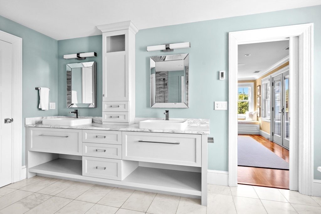 17 Mohawk Way Cohasset, MA 02025 - Photo 14 of 33 a spacious bathroom with a granite countertop sink mirror and bathtub