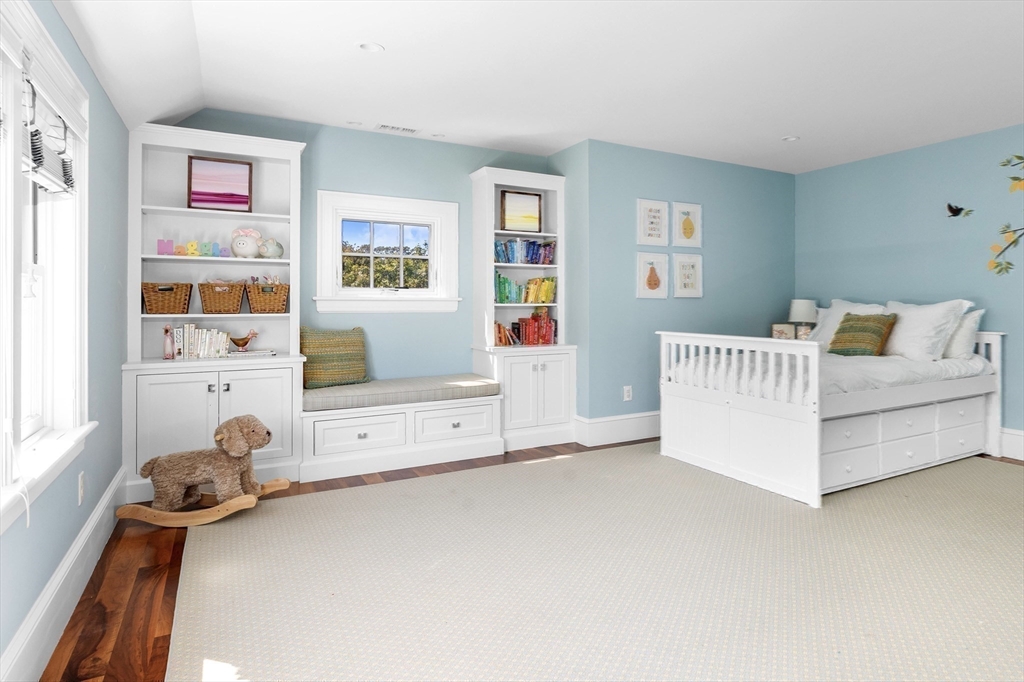 17 Mohawk Way Cohasset, MA 02025 - Photo 20 of 33 a bedroom with furniture and a couch