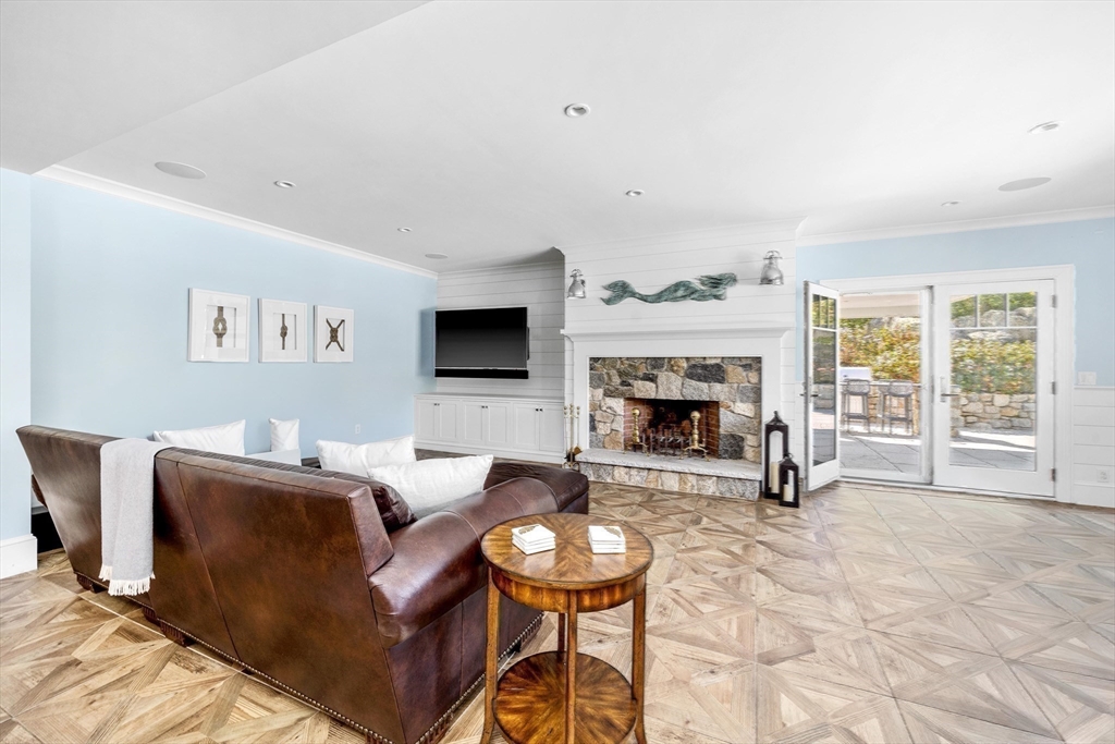 17 Mohawk Way Cohasset, MA 02025 - Photo 26 of 33 a living room with furniture and a fireplace