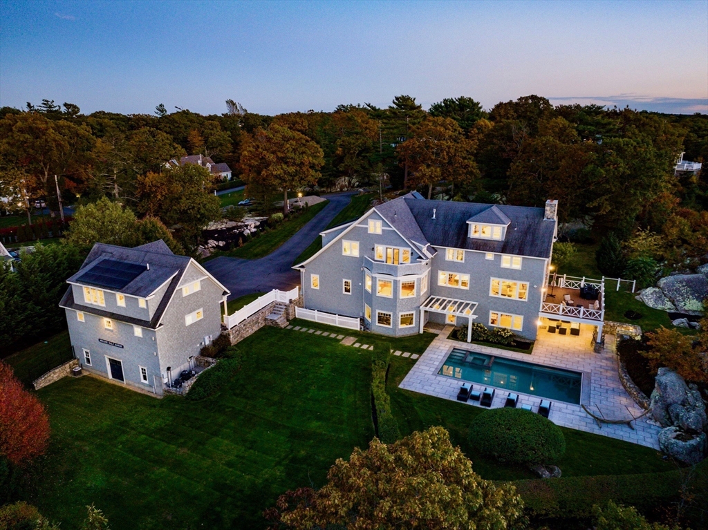 17 Mohawk Way Cohasset, MA 02025 - Photo 33 of 33 a front view of a house with garden and trees