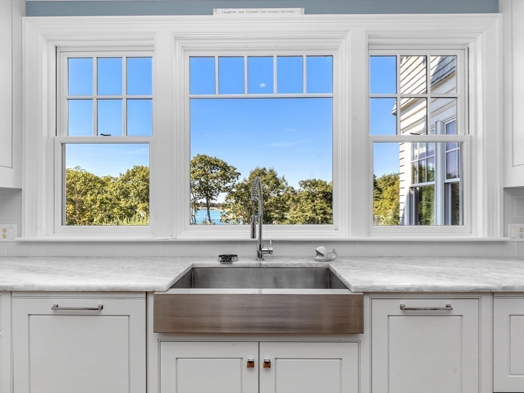 17 Mohawk Way Cohasset, MA 02025 - Photo 4 of 33 a view with granite countertop a sink and a window
