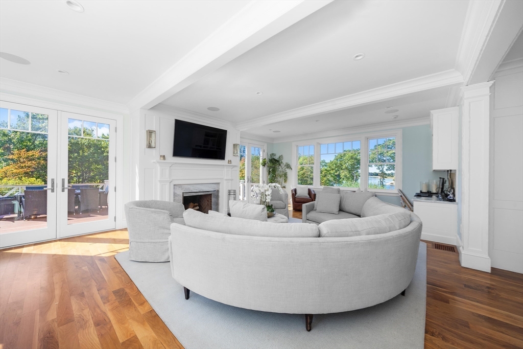 17 Mohawk Way Cohasset, MA 02025 - Photo 6 of 33 a living room with fireplace furniture and a flat screen tv