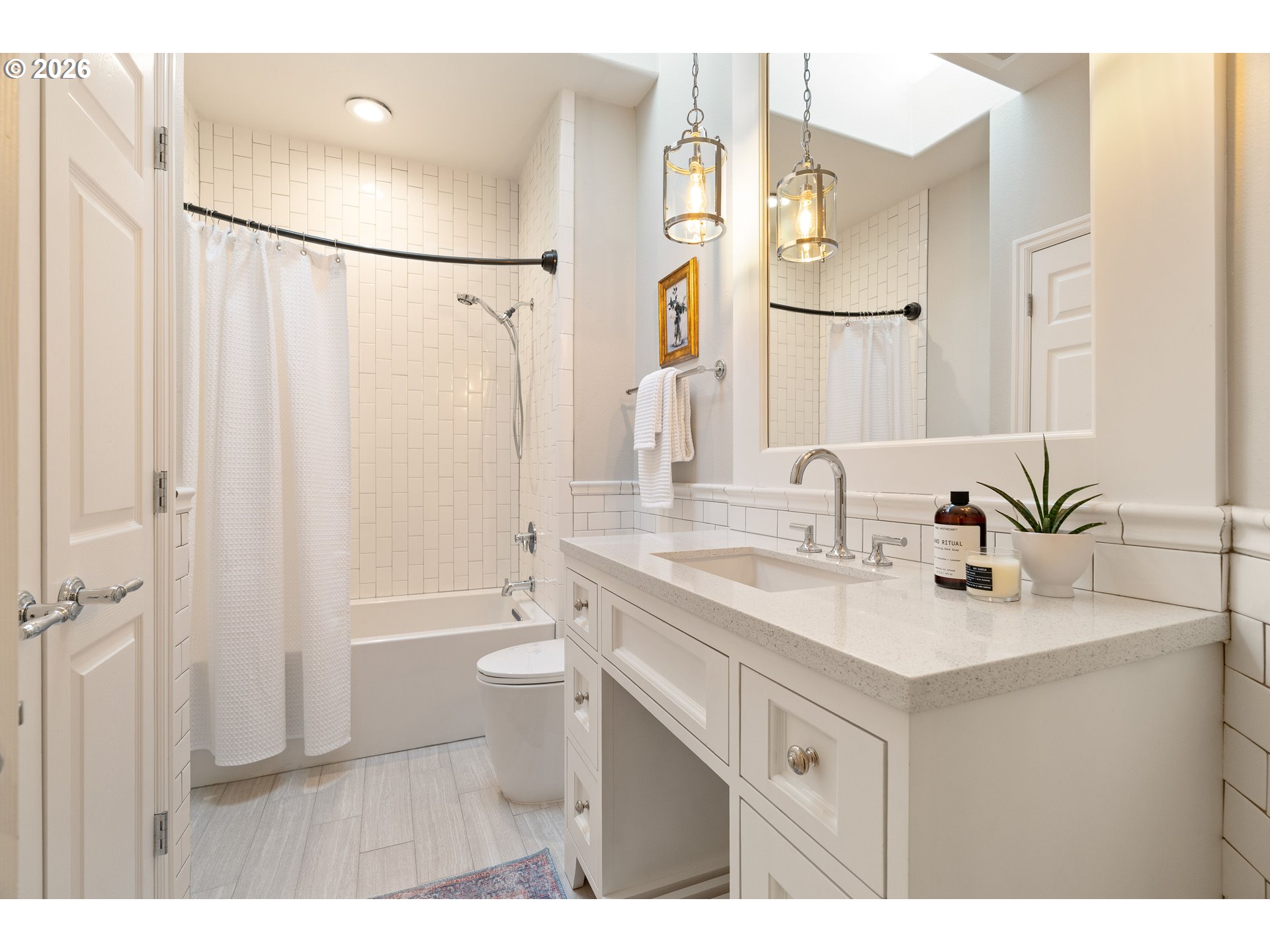 14401 Southeast Summit Court Clackamas, OR 97015 - Photo 27 of 47 a bathroom with a sink vanity granite tub shower and a mirror