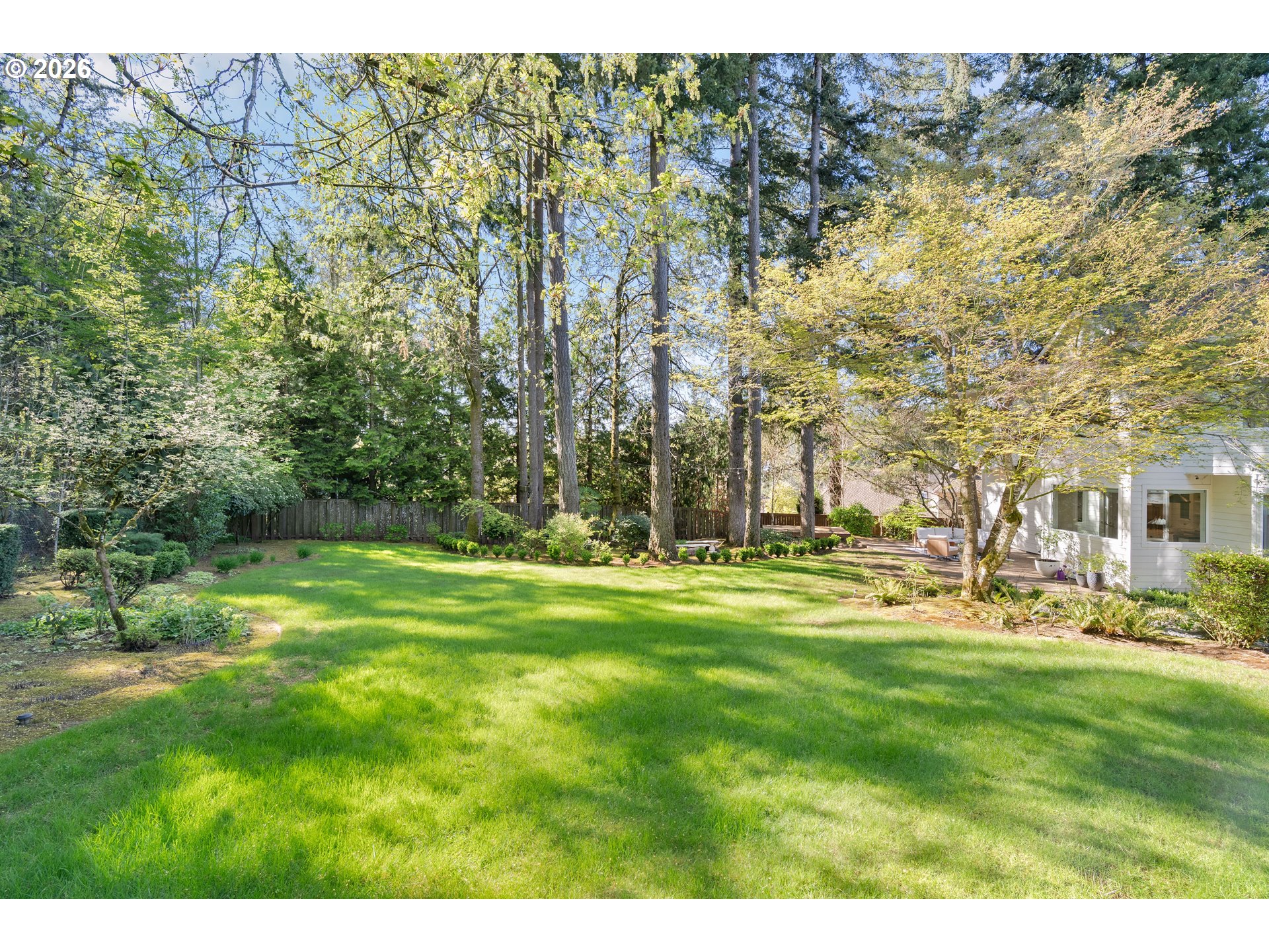 14401 Southeast Summit Court Clackamas, OR 97015 - Photo 41 of 47 a grassy field with trees in the background