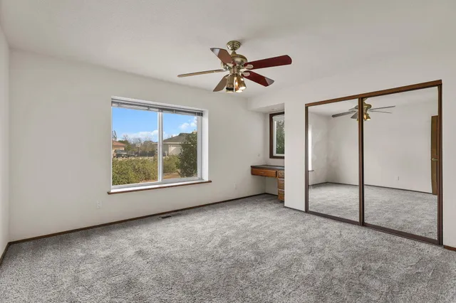 a view of a hallway with front door