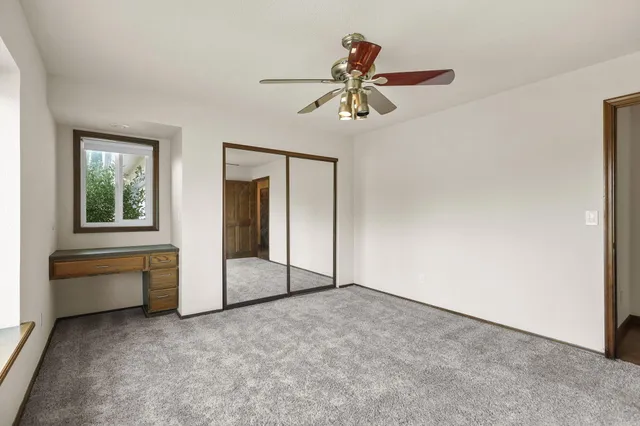 a view of a kitchen with electric appliances