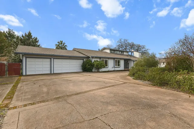 front view of a house with a large window