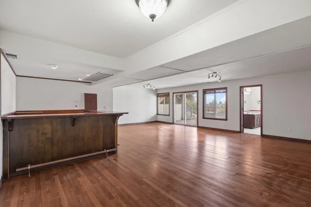 a view of a couches in backyard of the house