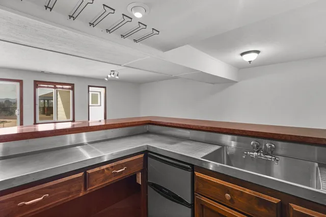 an aerial view of a house a garden and street