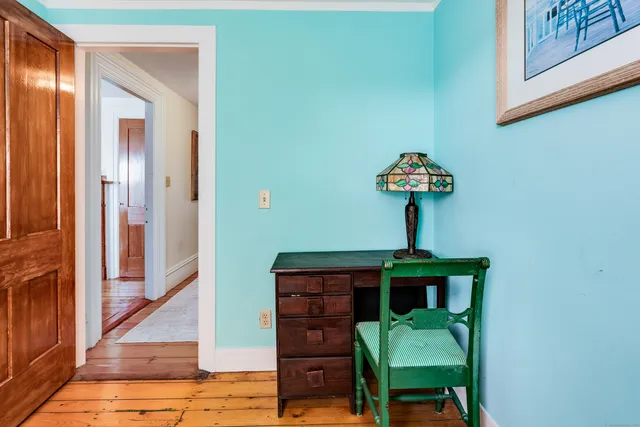 a hallway with cabinets