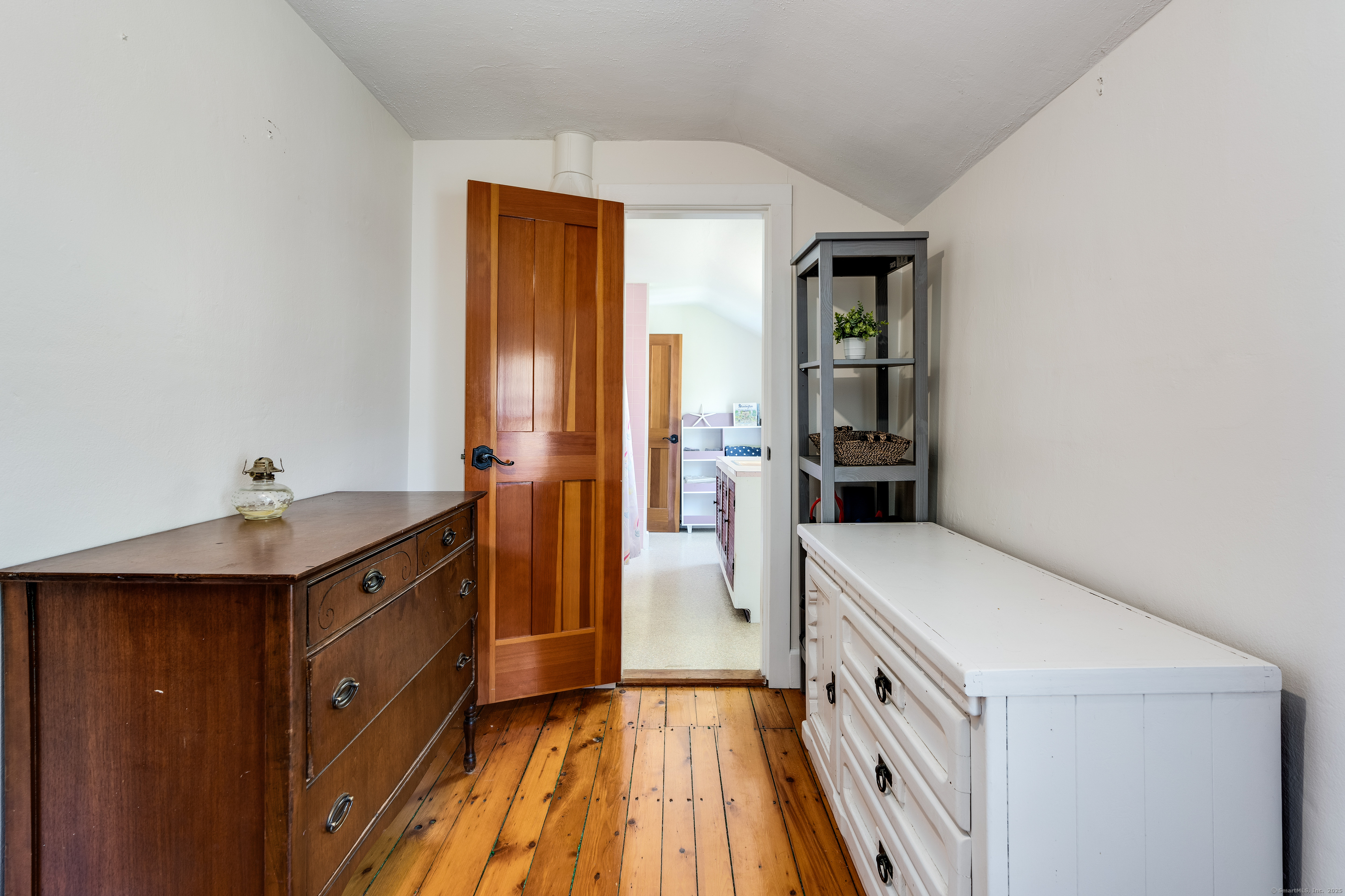 417 River Road Stonington, CT 06379 - Photo 29 of 39 a hallway with cabinets