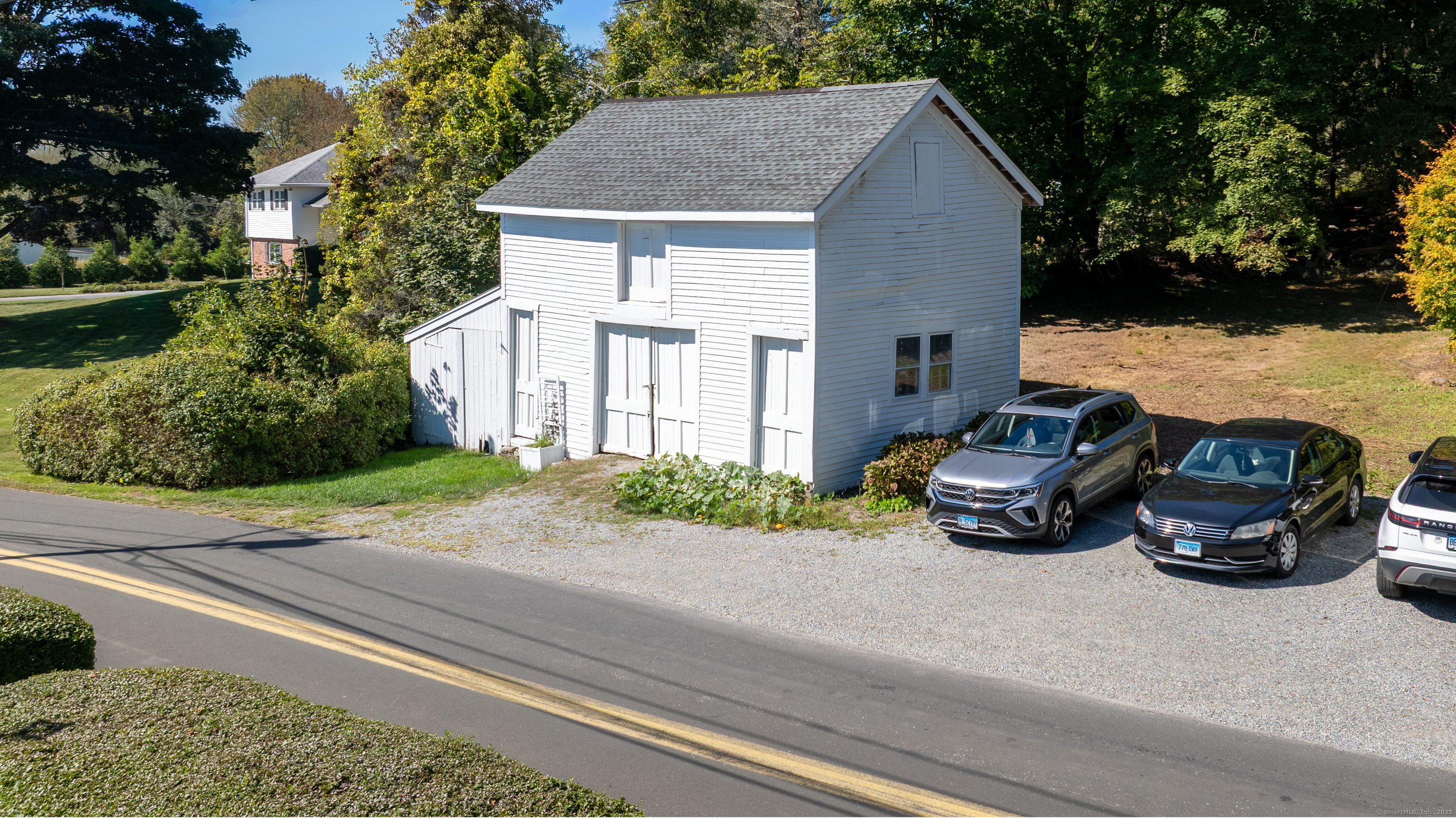 417 River Road Stonington, CT 06379 - Photo 32 of 39 Garage sits on the additional .33 acre parcel that is included with the sale.