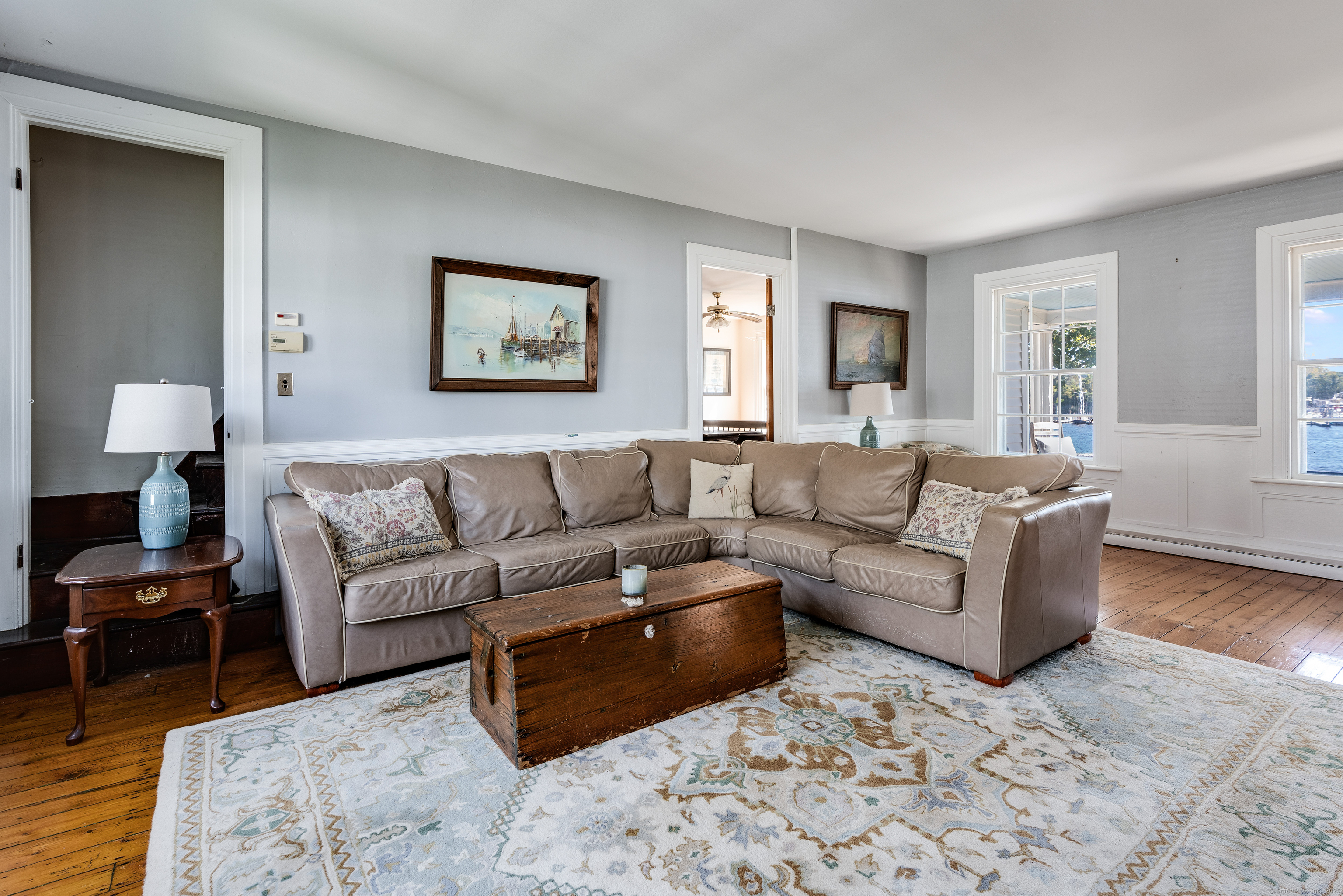 417 River Road Stonington, CT 06379 - Photo 5 of 39 a living room with furniture and a window