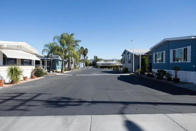 a view of street with parked cars