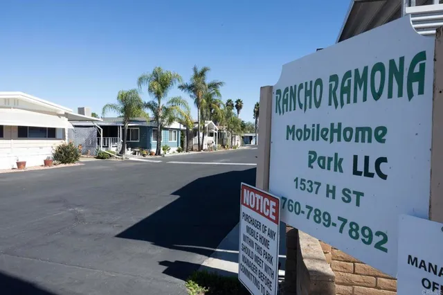 a sign that is on the wall of building