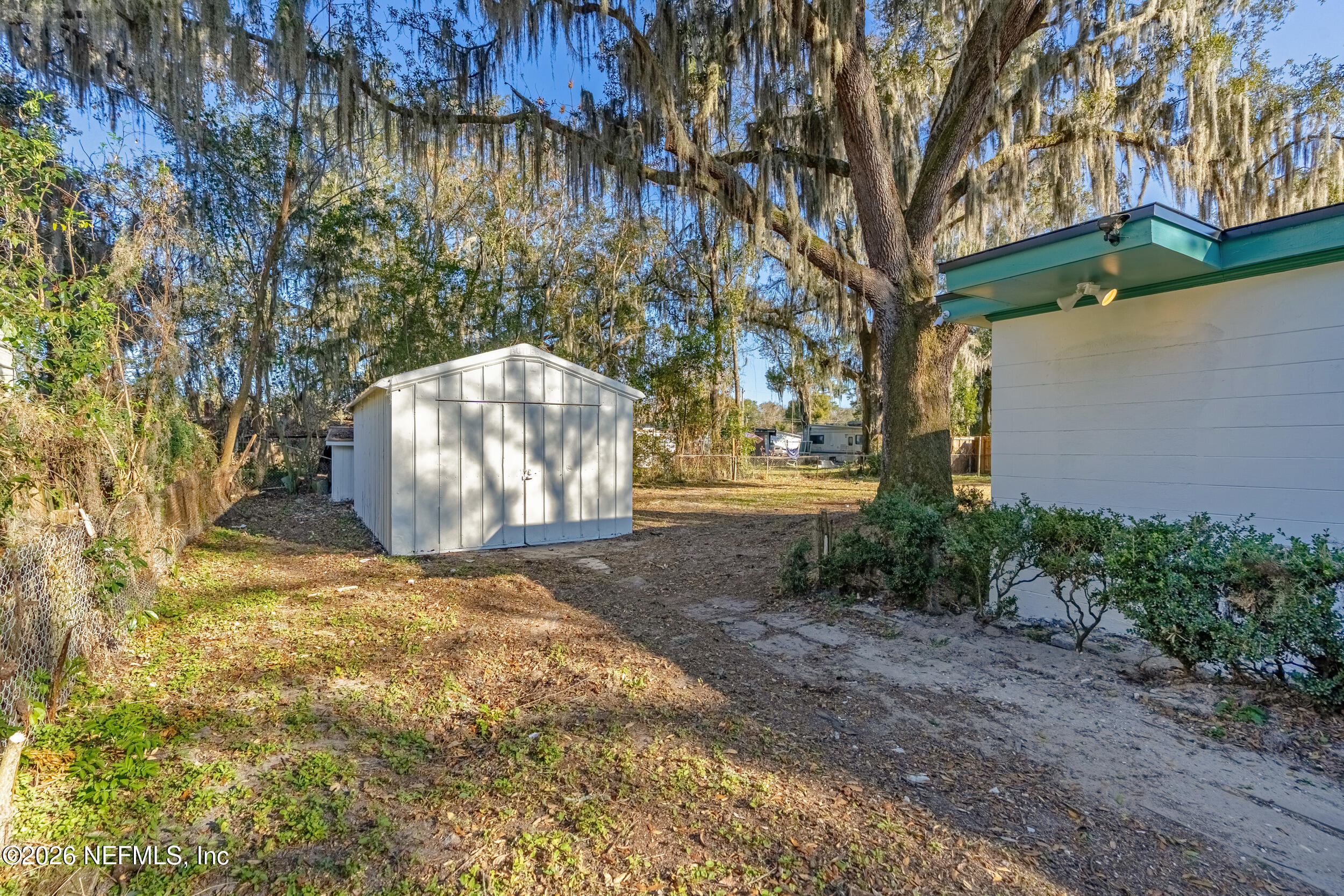 10531 Rutgers Road Jacksonville, FL 32218 - Photo 31 of 32 a view of a yard