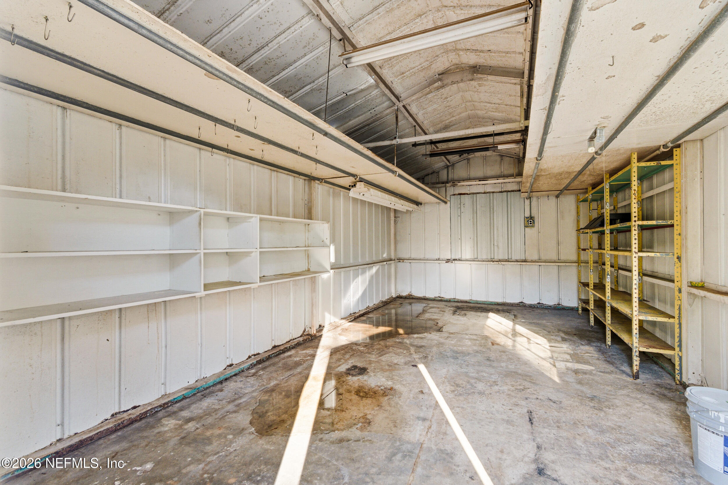 10531 Rutgers Road Jacksonville, FL 32218 - Photo 32 of 32 a view of an empty room with a staircase