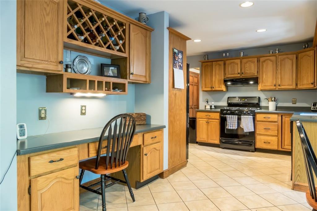 235 Hill Road West Bath, ME 04530 - Photo 8 of 35 The living room flows into the large...