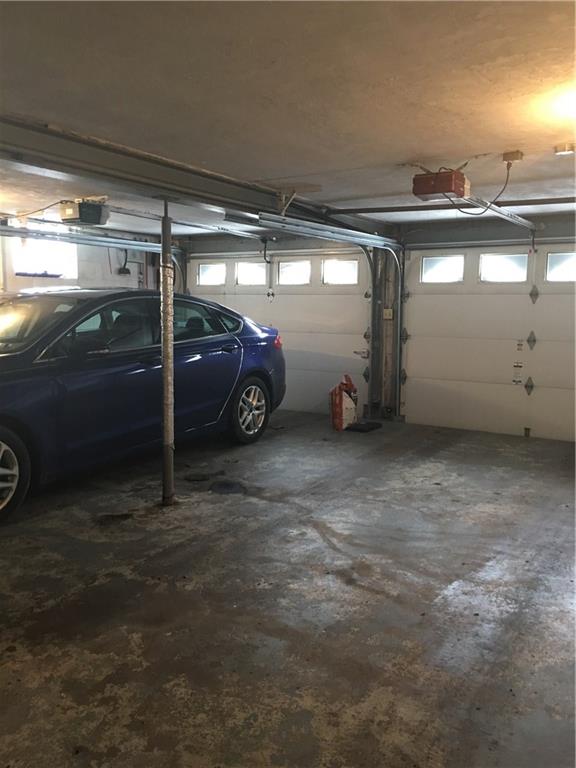 118 Beacon Road Renfrew, PA 16053 - Photo 14 of 24 Extra large 2 car integral garage with insulated doors and openers on both sides. Also housed in the garage is the included water softener system which is top of the line. Again, a bonus for the future owner.
